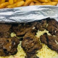 Steak Tips Platter · Served with salad and your choice of rice or fries.