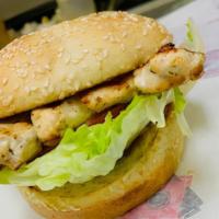 Grilled Chicken Sandwich · Served with salad and your choice of rice or fries.