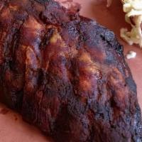 St Louis 1/2 Rack · St. Louis cut pork ribs, rubbed, smoked, and served with white bread, a taste of apple slaw ...