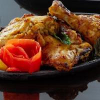Tandoori Chicken · Bone in chicken and tandoori marinade. Served with rice.