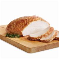 Rotisserie Split Turkey Breast · Tender roasted turkey breast.