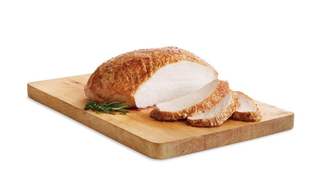 Rotisserie Split Turkey Breast · Tender roasted turkey breast.