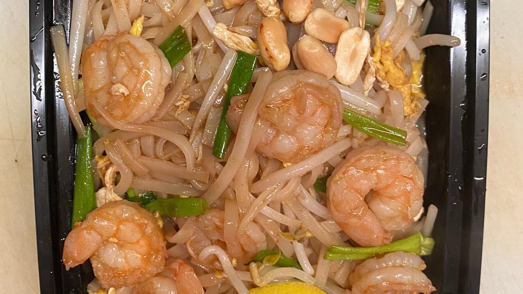 Shrimp Pad Thai虾炒泰面 · Popular fat rice thai noodles with bean sprouts, scallion, eggs and toasted peanuts.