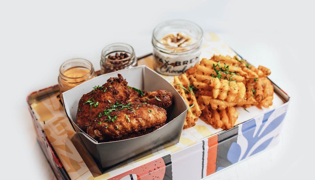 Smoky Dry Rubbed Chicken Wings · Our Dry Rubbed Chicken Wings are baked to perfection.  Fried to order and tossed in your choice of BBQ, Sriracha Buffalo or Teriyaki Sauce; served w/ Cocoa Spiced  Waffle Fries.  Choice of Dessert - S'mores Concoctions or Melting Heart Cake.