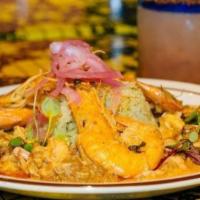 Tumbada (Paella) · Veracruz-style paella, epazote scented rice, chicken, chorizo, shrimp, squid, fish, achiote ...