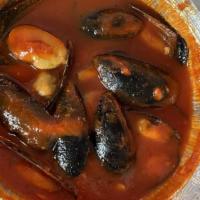 Mussels · Served in red or white sauce.