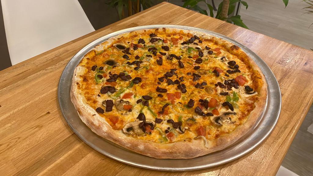 Vegie Lovers Pizza  · Red Sauce, Mozzarella, fresh tomatoes, Mushrooms, Onion, Olives, Green peppers, and Daily Fresh Dough. Choice of size.