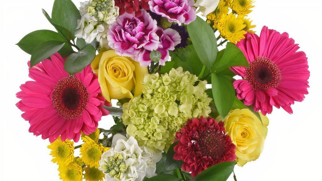 Debi Lilly Happy Bouquet · Fun and colorful bouquet sure to bring a smile to anyone's face. Flowers & colors may vary by season.