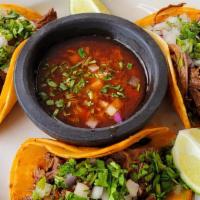 Beef Birria Dinner    · Shredded beef cooked in our unique ingredients, blasting with flavor. Served on corn tortill...
