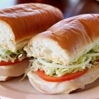Turkey & Cheese Hoagie · Turkey deli meat, American cheese, lettuce, tomatoes, mayo, onions, pickles, sweet peppers, ...
