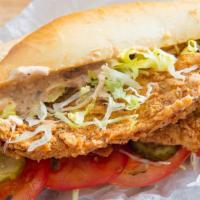 Fish Hoagie · White fillet breaded fish, choice of American cheese, lettuce, tomatoes, mayo, onions, pickl...