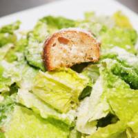 Caesar Salad · Romaine, croutons, with Caesar dressing, and parmesan cheese.