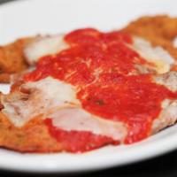 Parmesan · Choice of chicken or veal cutlets sliced thin, pounded to perfection! Breaded and pan-fried ...