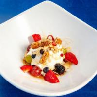 Greek Yogurt · Choice of honey and crushed walnuts/pecans, sour cherry preserves or orange preserves.