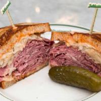 Jules Reuben
 · Corned Beef, Swiss Cheese, Sauerkraut, Russian Dressing on Rye.