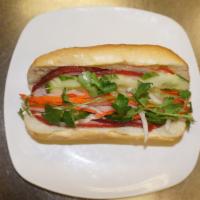 House Sandwich · Pate, pickled, vegetables, pepper, cucumber, cilantro.