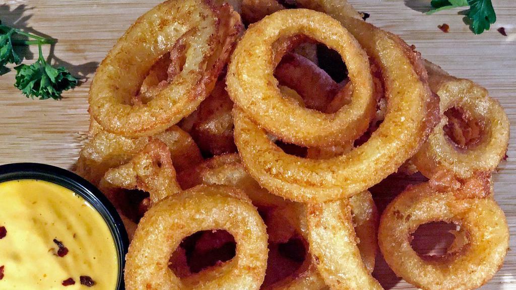 Beer Battered Onion Rings · Mmmm beer. Served with our Boom Boom dipping sauce.