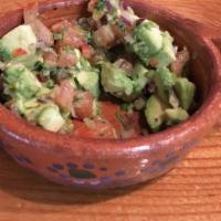 Guacamole Tradicional · Avocado, pico de gallo, and a smoky guajillo sauce.