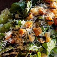 Caesar Salad · Lettuce, Parmesan Cheese, Croutons w/flour Tortilla & Caesar Dressing.