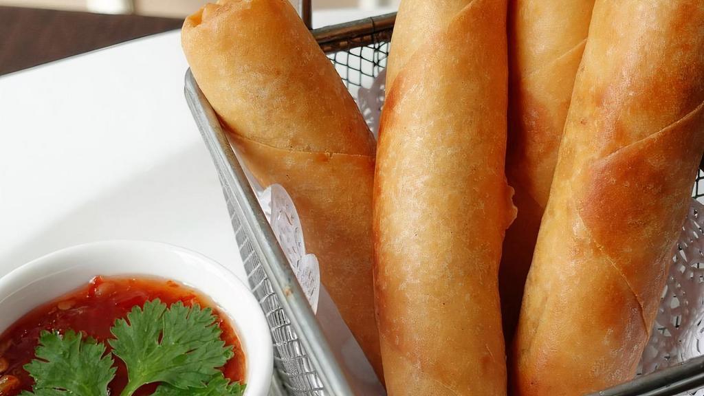 Chick Chick Rolls · Crispy spring rolls with chicken, carrot, onion, cabbage, and celery served with sweet and sour sauce.