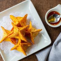 Pyramid Rangoon (Crab Rangoon) · Deep-fried crab meat, cream cheese, carrot, and onion stuffed into wonton wrappers served wi...