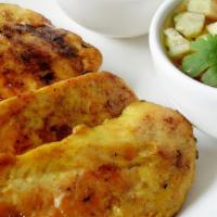 Chicken Satay · Grilled marinated white meat chicken on skewers served with peanut sauce and sweet & sour sa...