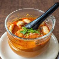 Tom Yum Noodle Soup · Medium Spicy. Thin rice noodles with shrimp, mushroom, bean sprout, onion, tomato in Thai ho...