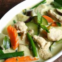 Green Curry · Spicy. Very spicy curry with bamboo shoot, broccoli, bell pepper, green bean, snow pea, zucc...