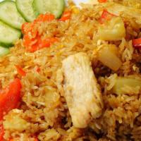 Pineapple Fried Rice · Fried rice with chicken, shrimp, scrambled egg, pineapple, carrot, onion, bell pepper, snow ...