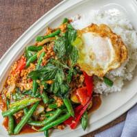 Chicken Ka Prow · Medium Spicy. Sautéed ground chicken with onion, bell pepper, green bean, and basil leaves i...