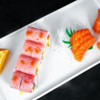 Mame Nori · Spicy. Tuna, salmon, avocado, mango with soy wrapper topped with flying fish roe and chef sa...