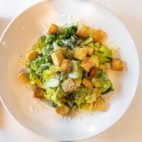 Caesar Salad · Crisp romaine tossed with Parmesan cheese and our homemade dressing.