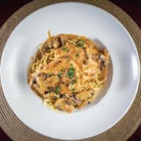 Chicken Marsala · Chicken breast sautéed with shallots and mushrooms in a marsala wine demi glaze. Served over...