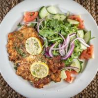 Chicken Milanese · Chicken bread pounded, lightly breaded and pan fried with fresh squeezed lemon. Juice. Finis...