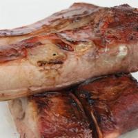 Bbq Spare Ribs · Broiled roasted or grilled. a cut of meat from the bottom section of the ribs.