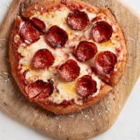 Kid'S Pepperoni Pizza · fluffy mini crust, house-made tomato sauce, mozzarella blend, Applegate pepperoni, grana pad...