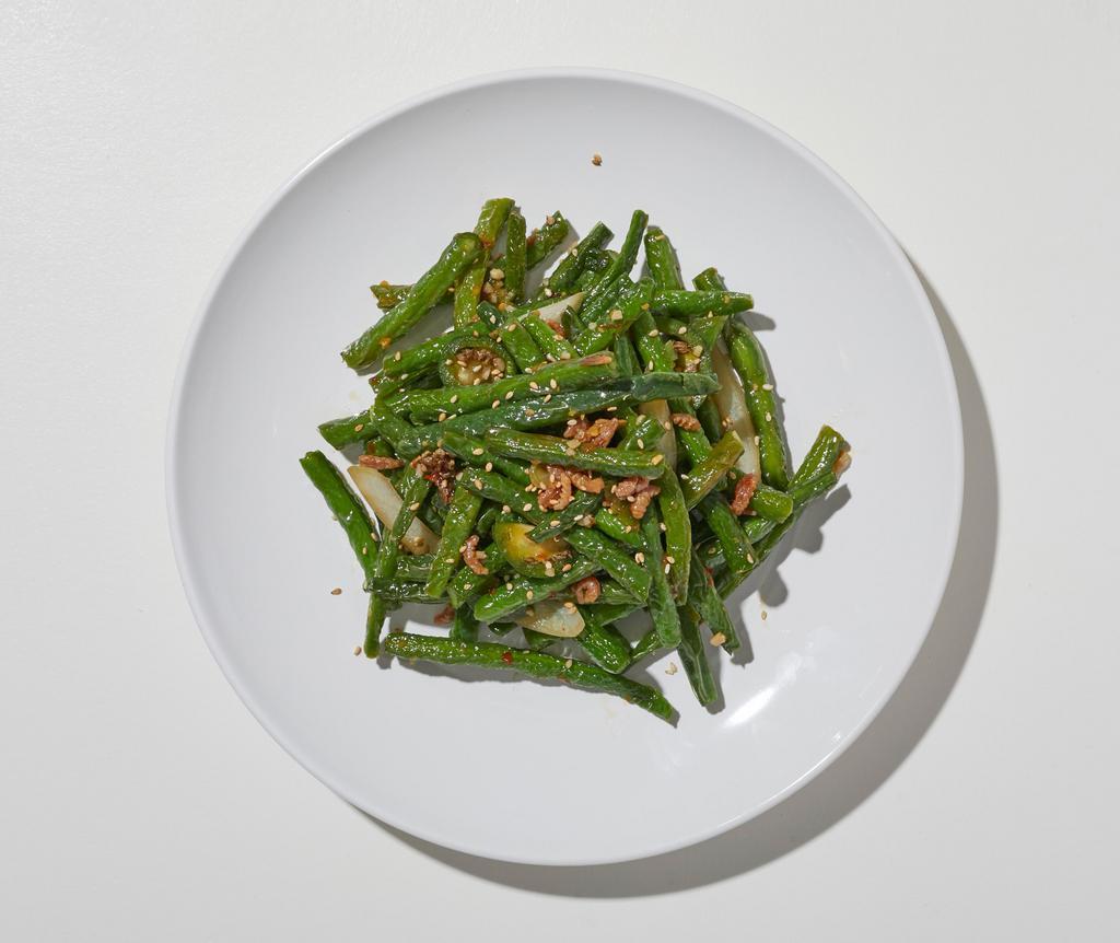 Chinese String Beans · Spicy chili sautéed with string beans in a chili garlic brown sauce.