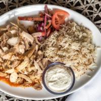 Chicken Shawarma Bowl · Lebanese rice, garlic, sumac onions, pickled vegetables, roasted roma tomato.