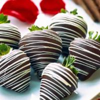 Chocolate Dipped Strawberry · Hand-dipped in Founding Farmers 60% classic dark chocolate.