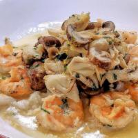 Shrimp & Crab Risotto · Shrimp and crab served over creamy parmesan risotto with roasted wild mushrooms and lemon he...