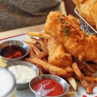 Fish & Chips · A traditional fish & chips feast. Fresh cod battered and lightly fried with Old Bay and serv...
