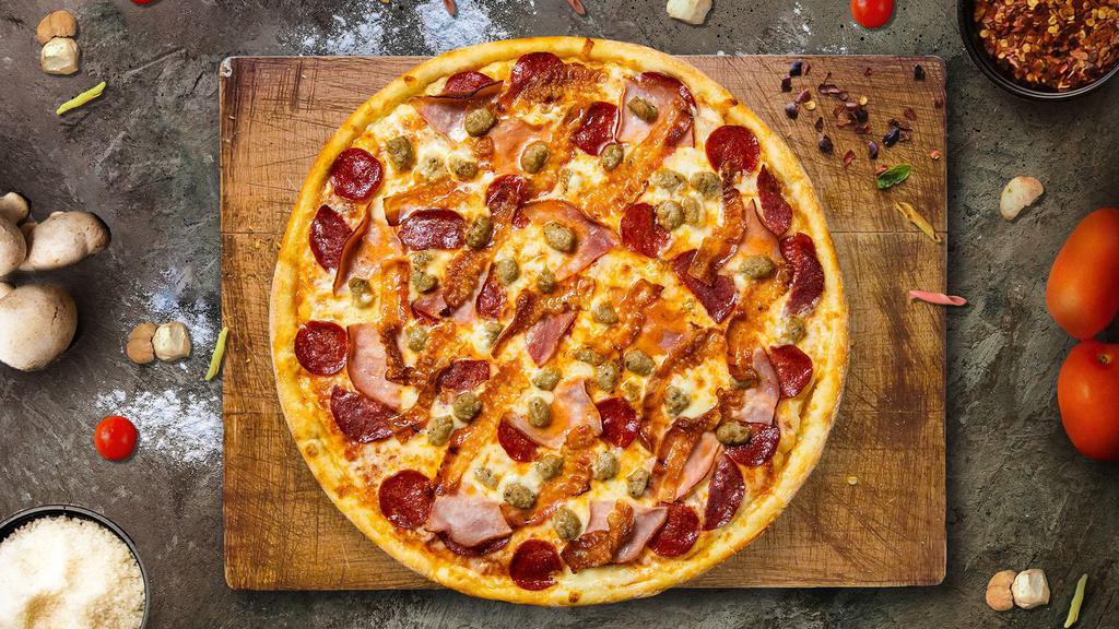 Meat Freak Pizza · Grilled chicken, Italian sweet sausage, hot sausage, homemade meatball, pepperoni and house pizza cheese baked on a hand-tossed dough.