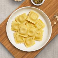 Invent A Ravioli · Fresh ravioli pasta cooked with your choice of sauce and toppings.