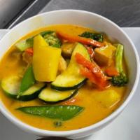 Mango Curry (Gf) · Thai traditional red chili paste, coconut milk, mango, green beans, snow pea and broccoli.
