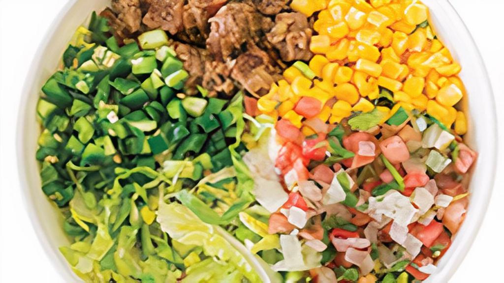 Ensalada · build your own salad - choose from romaine and supergreens, then add protein and toppings of your choice; side of guajillo or cilantro-lime dressing available
