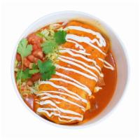 Burrito Mojado · rice, black beans, and choice of toppings wrapped with a flour tortilla; topped with Salsa d...