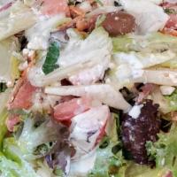 Greek Salad · Romaine lettuce, spring mix, tomatoes, cucumbers, feta cheese, olives, red onions, & tahini ...