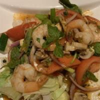 Lime Shrimp Salad · Hot. Steamed shrimp with red onion, lemongrass, tomato, mushroom, lettuce, scallion and cila...