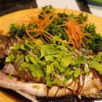Fish Ka Pow · Fried fillet of fish with red and green pepper, mushroom and basil leaves in thai style spic...