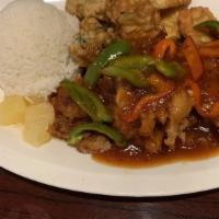 Crispy Chicken · Fried crispy chicken on bed of vegetable tempura with pineapple, red and green pepper topped...